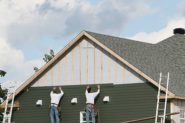 Professional Storm Damage Siding Repair technician working in White Post, VA